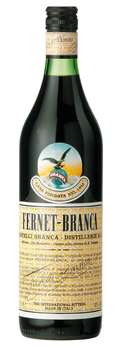 Bottle of Fernet-Branca Italian amaro with its eagle-and-globe emblem and Milanese label
